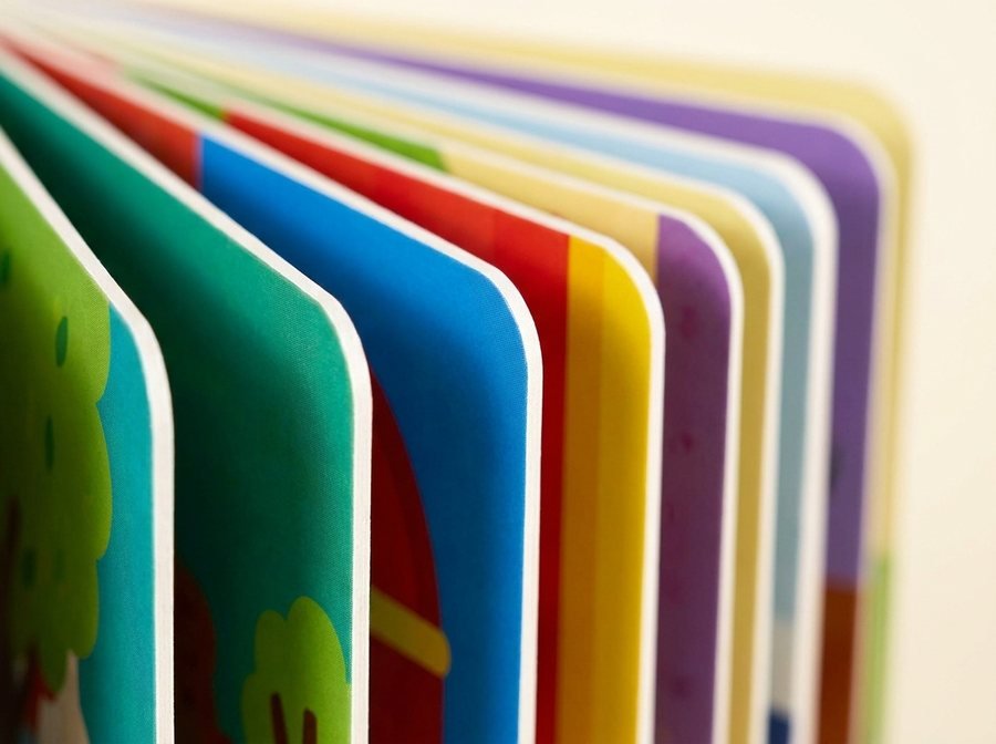 Fanned board pages showing the white core